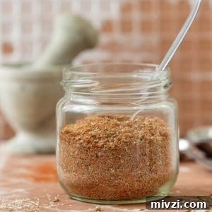 Homemade Fajita Seasoning Mix in the small jar