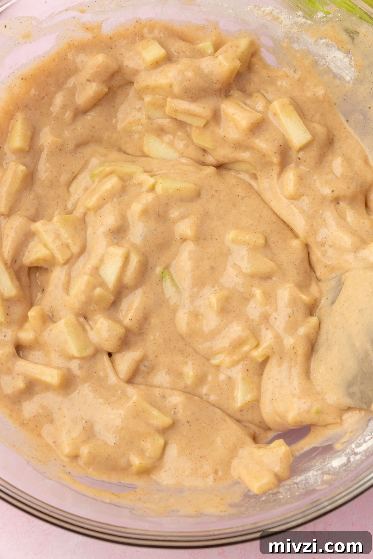 Crispy Gluten-Free Apple Fritters Recipe 10 Gluten-free apple fritter batter after mixing, with chunks of apple visible throughout.