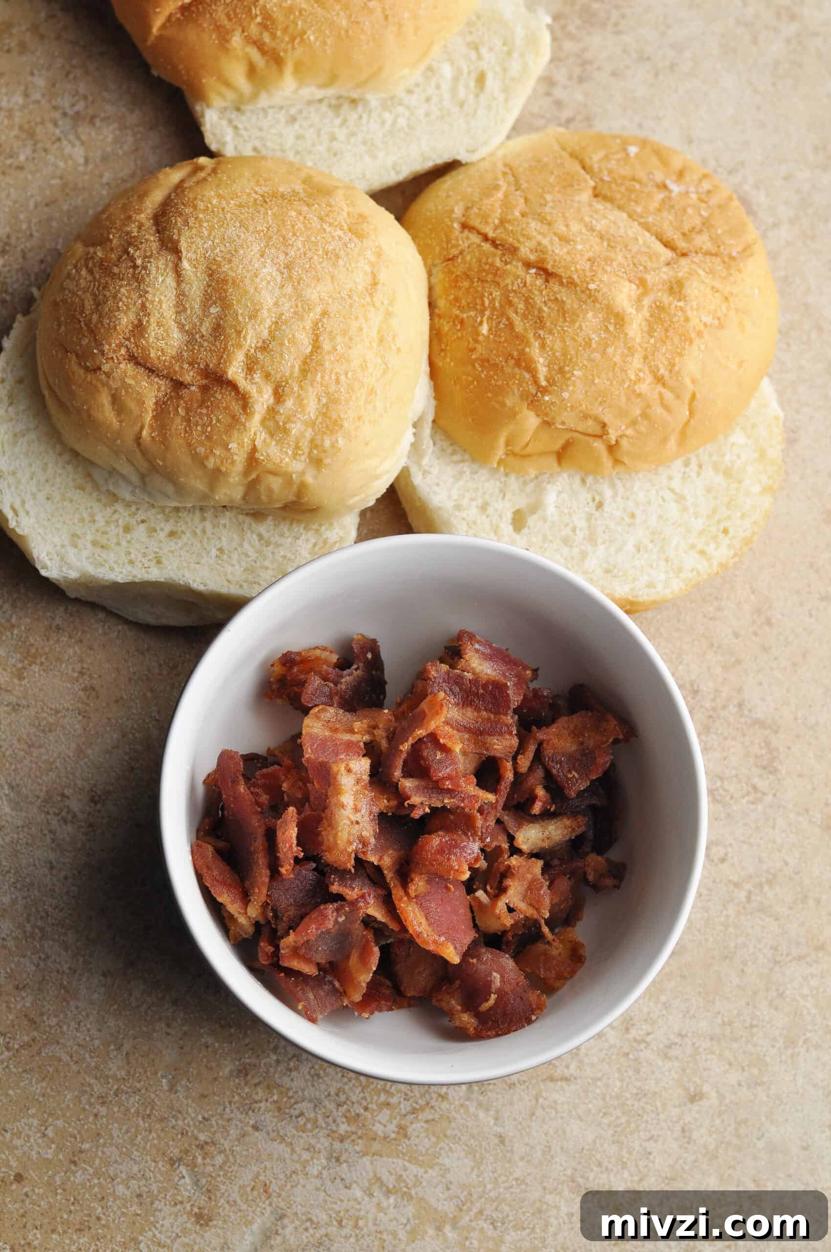 Step 1: slice rolls and cook bacon