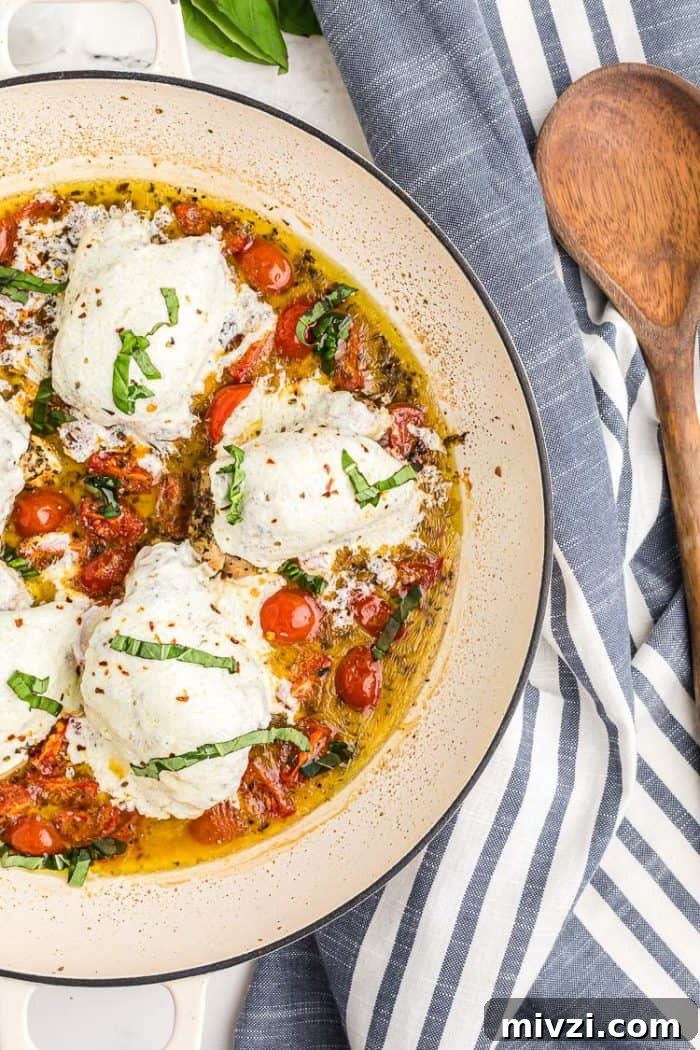 overhead view of keto chicken thighs covered with mozzarella cheese