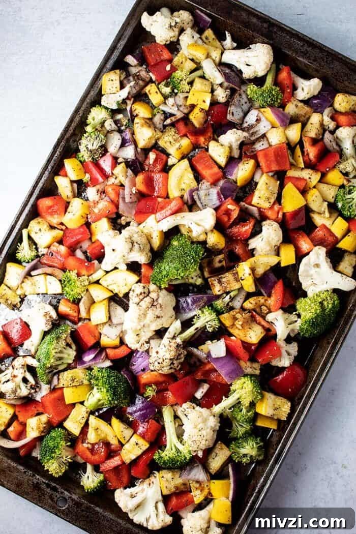 overhead view of large baking sheet of keto roasted vegetables