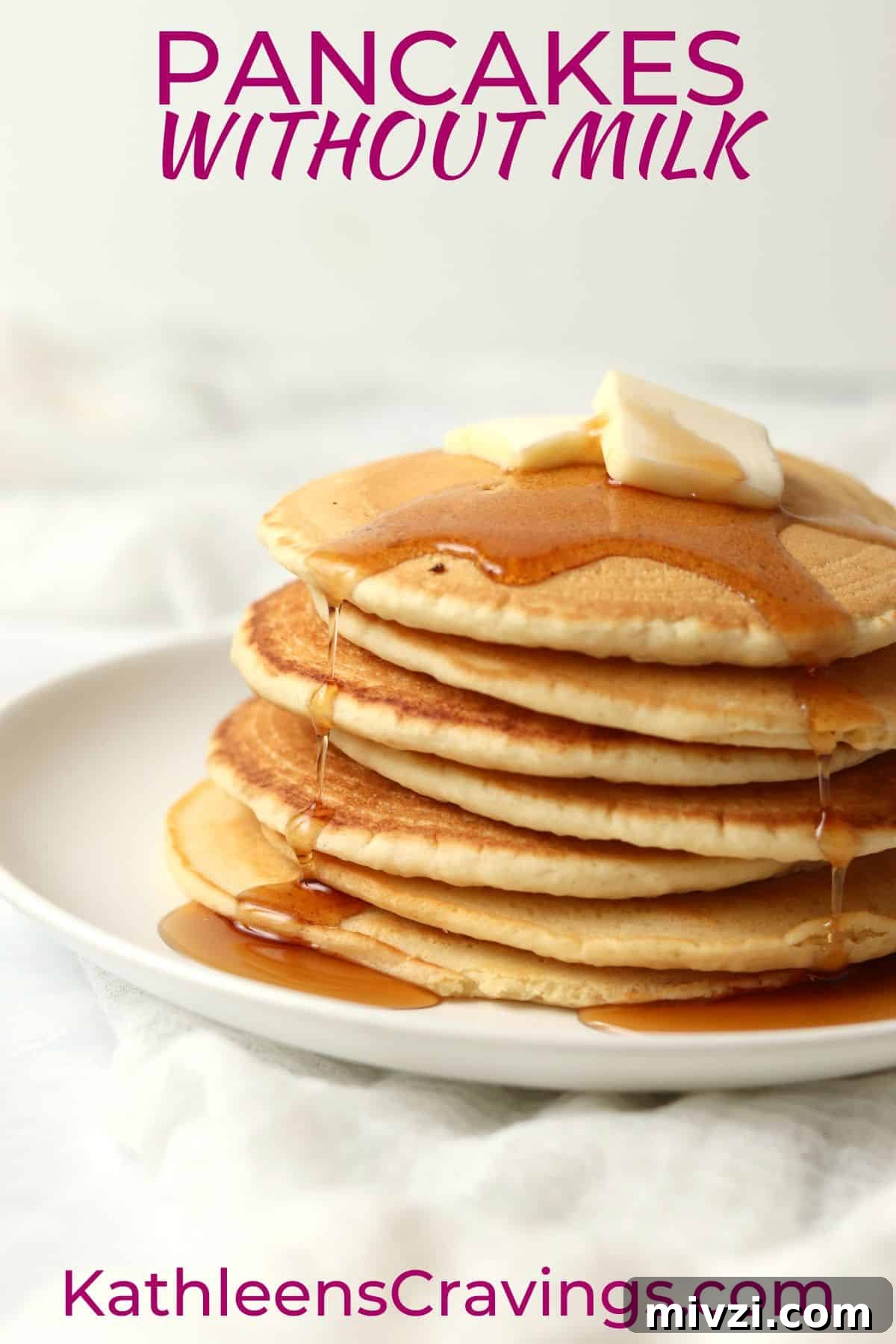stack of homemade pancakes without milk with butter and syrup