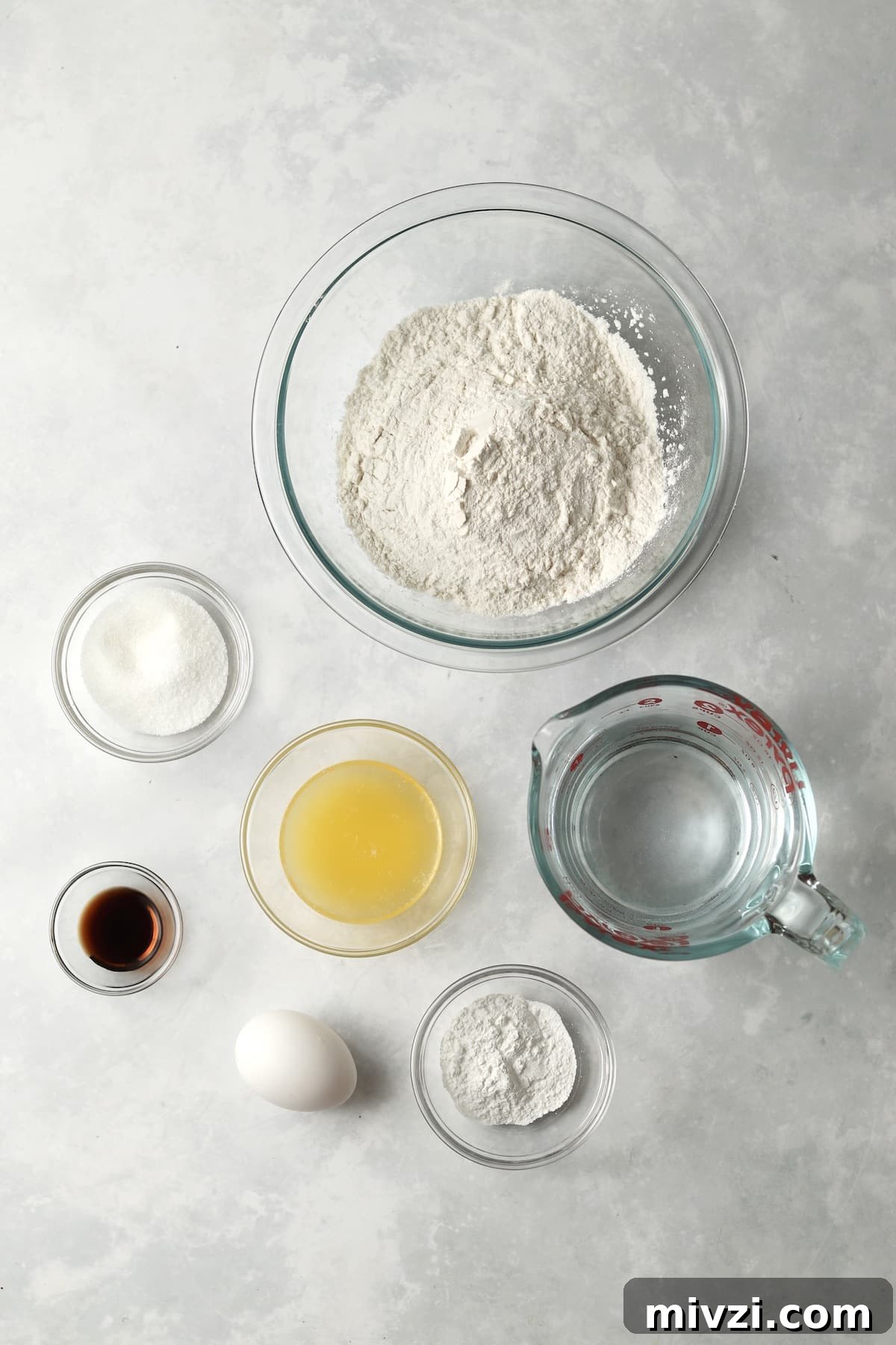 Ingredients - flour, baking powder, sugar, water, melted butter, egg, and vanilla