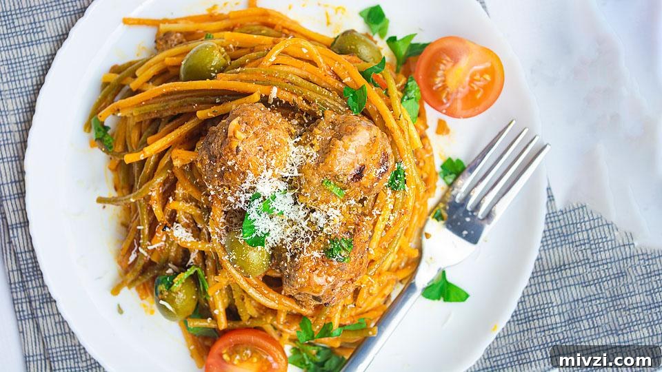 29 Cozy One-Pot Fall Dinners That Cut the Cleanup 14 A plate with pasta and meatballs.