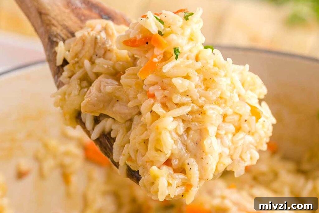 29 Cozy One-Pot Fall Dinners That Cut the Cleanup 20 One pot chicken and rice in a white pot.