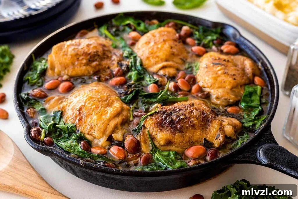 29 Cozy One-Pot Fall Dinners That Cut the Cleanup 21 A cast iron skillet with a chicken and beans dish.