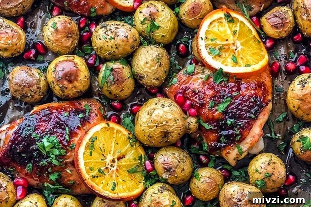29 Cozy One-Pot Fall Dinners That Cut the Cleanup 23 Honey Orange Roasted Chicken on a sheet pan with potatoes and oranges.