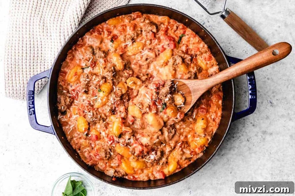29 Cozy One-Pot Fall Dinners That Cut the Cleanup 30 A skillet of creamy gnocchi with cheese over top.