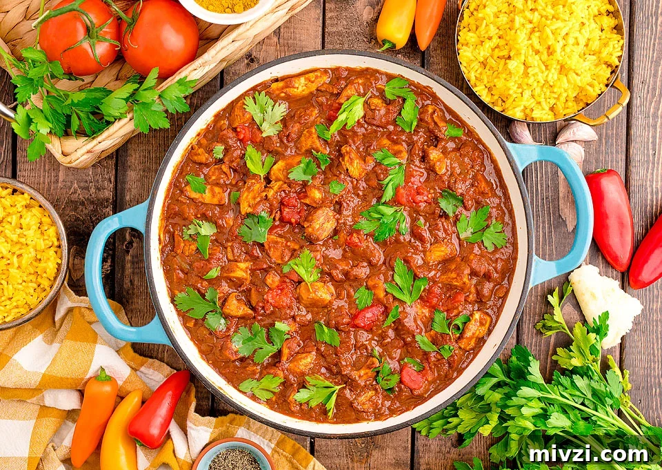 29 Cozy One-Pot Fall Dinners That Cut the Cleanup 7 Chicken madras curry in a bowl.