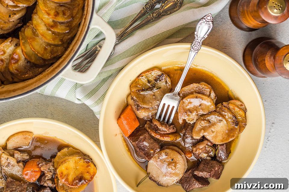29 Cozy One-Pot Fall Dinners That Cut the Cleanup 9 Overhead view of bowls of a beef and potato dish.
